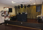 Setup on stage, ready to DJ for a 21st at The Ratcliffe Bars & Function Suites, next to Rochdale Football Club, in Rochdale